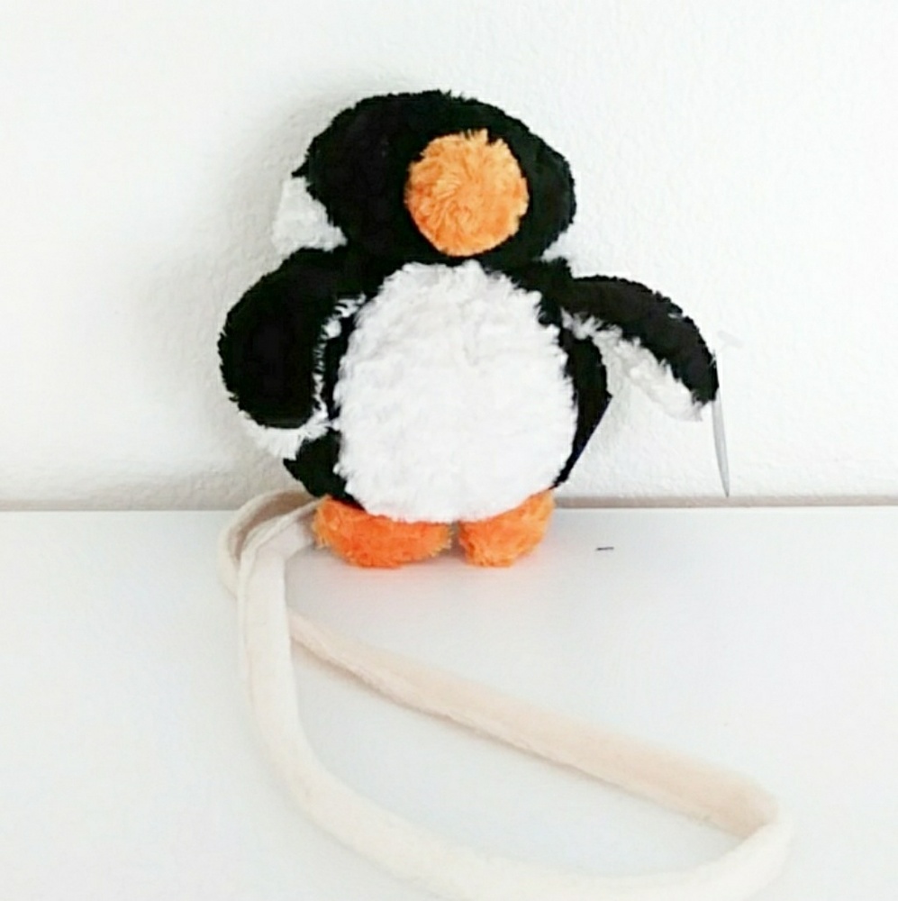 Stuffed penguin cell phone cover